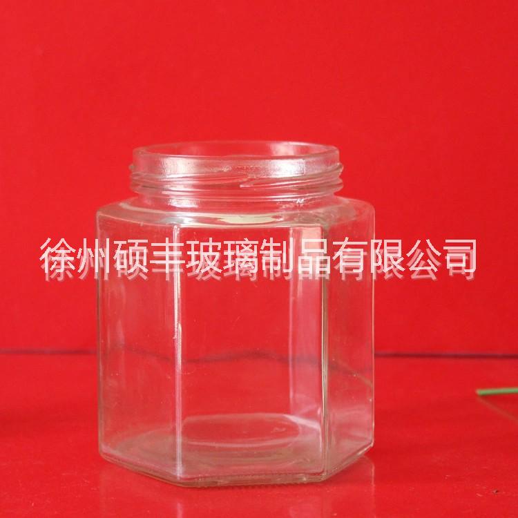 徐州市六棱玻璃瓶蜂蜜包装密封罐果酱菜瓶厂家