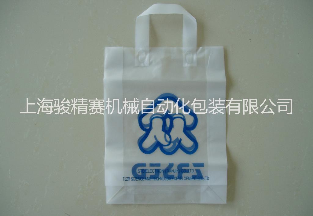 塑料袋是用什么机器做的上海骏精赛厂家有全自动锡金标贴焊接机能做塑料袋胸牌名片册都可用图片