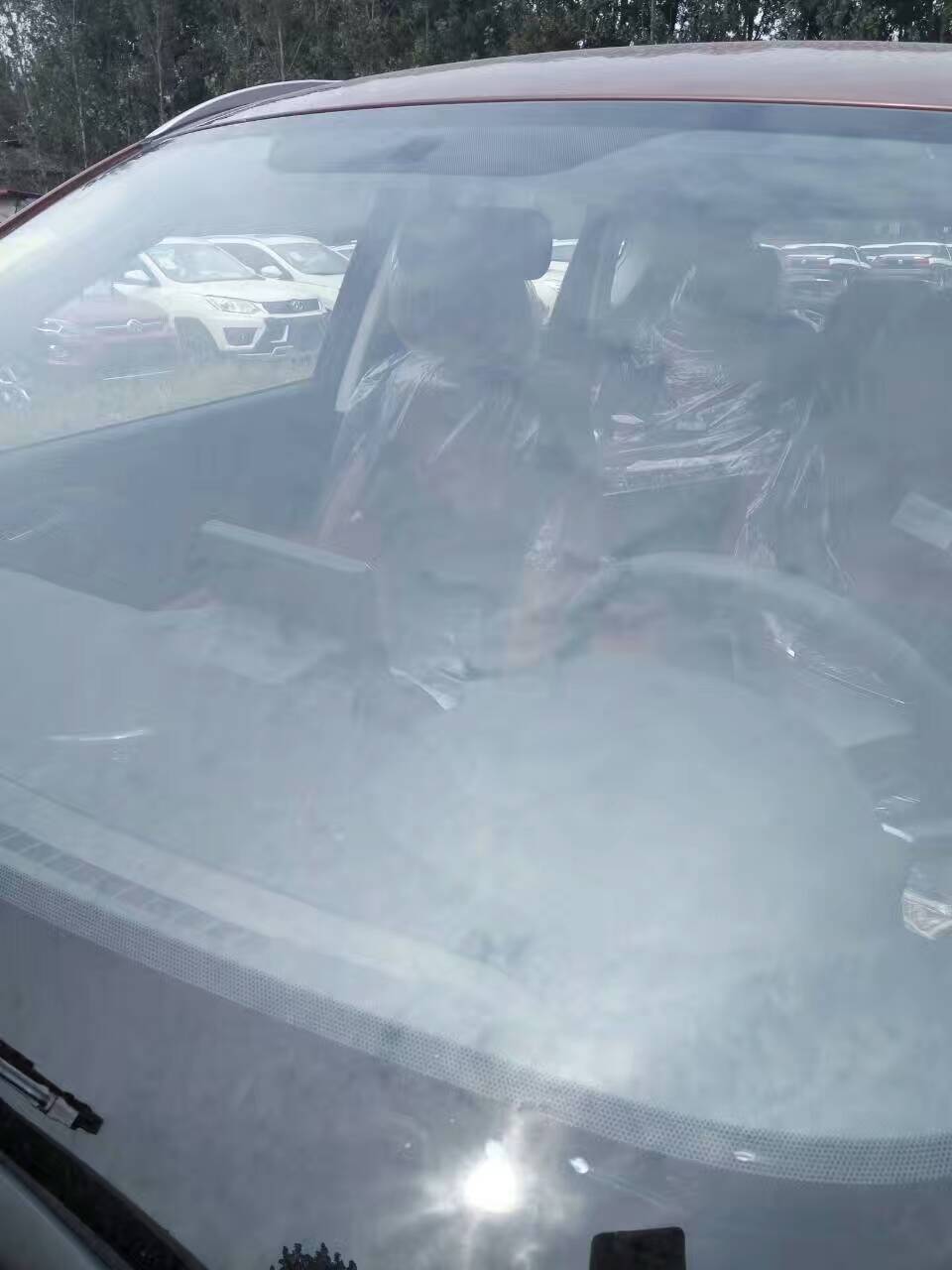 郑州修复汽车玻璃最有经验的师傅---郑州高手汽车挡风玻璃修补图片