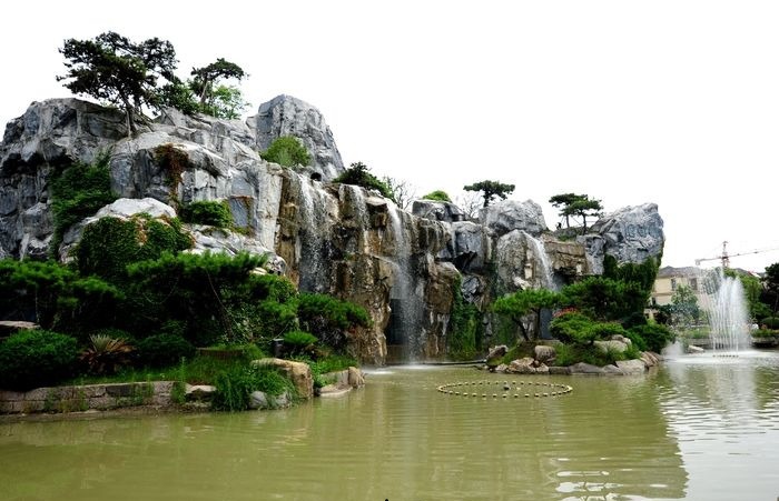 重庆市公园水泥塑石假山跌水景观设计规划厂家