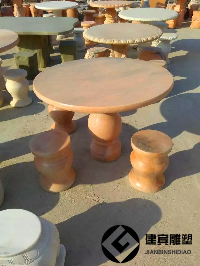 石雕圆桌 天然晚霞红石桌子 大理石石桌石凳图片