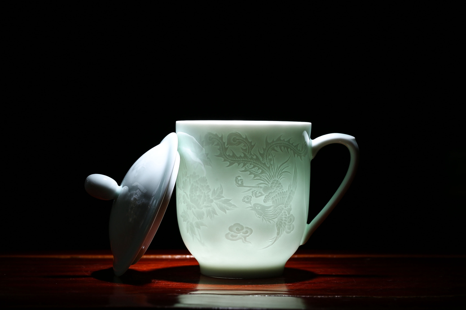 景德镇影青釉茶杯 影青雕刻办公杯图片
