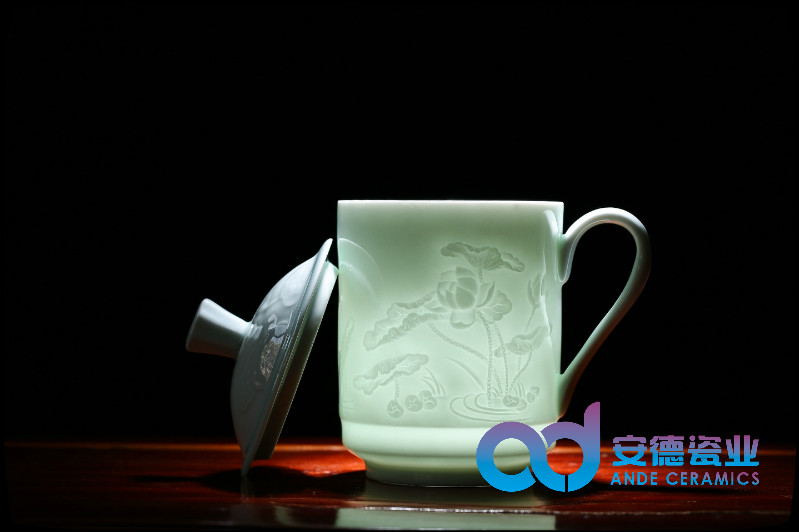青釉雕刻图案陶瓷茶杯厂家定制批发图片