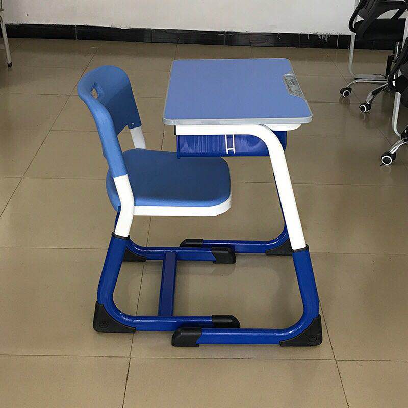 双人学生桌椅 蓝色秋深弯升降课桌椅图片