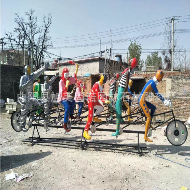 玻璃钢骑车小丑雕塑 彩绘小丑 玻璃钢人物雕塑 商业街步行街雕塑图片