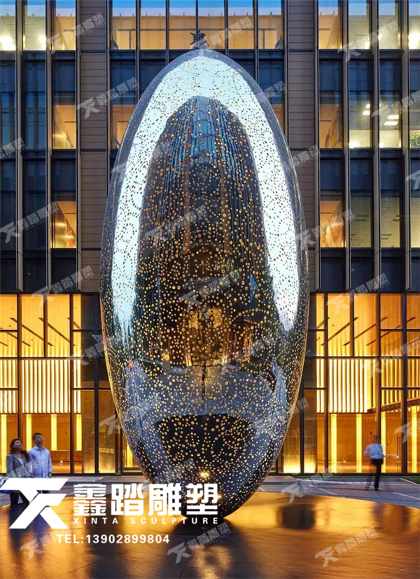 椭圆形广场发光不锈钢雕塑 内置LED灯带 圆形穿孔造型透光好  表面镜面非常透亮