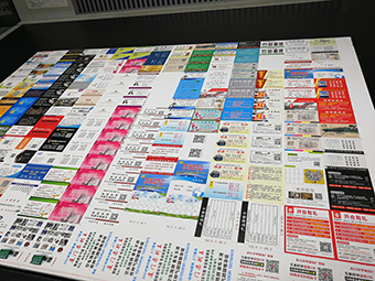 郑州写真喷绘条幅彩页名片展板展架纸制品设计印刷易拉宝锦旗车贴图片