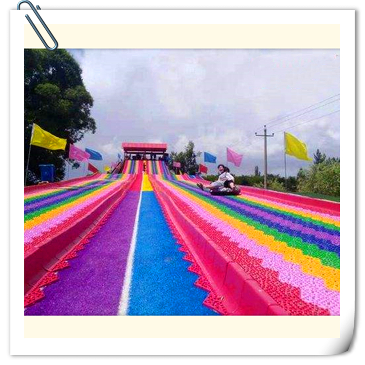 彩虹变七彩滑梯 彩虹滑梯 七彩滑道游乐园设备 景区游乐设备图片