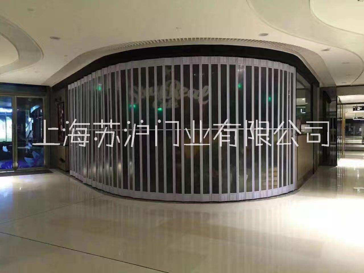 上海苏沪门业专业生产侧向门、折叠门、、豪华水晶门、防爆门、防火卷帘门、抗风门等