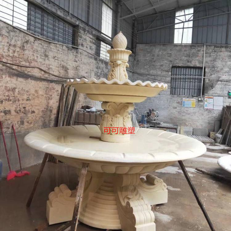 广州市人造砂岩流水喷泉小天使雕塑摆设厂家