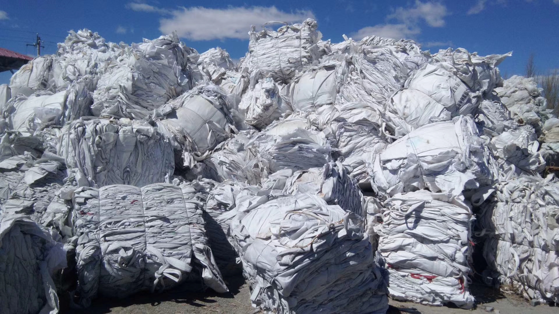 河北氧化铝吨包袋回收厂、价格、回收电话、回收商【银川正光塑料颗粒加工厂】