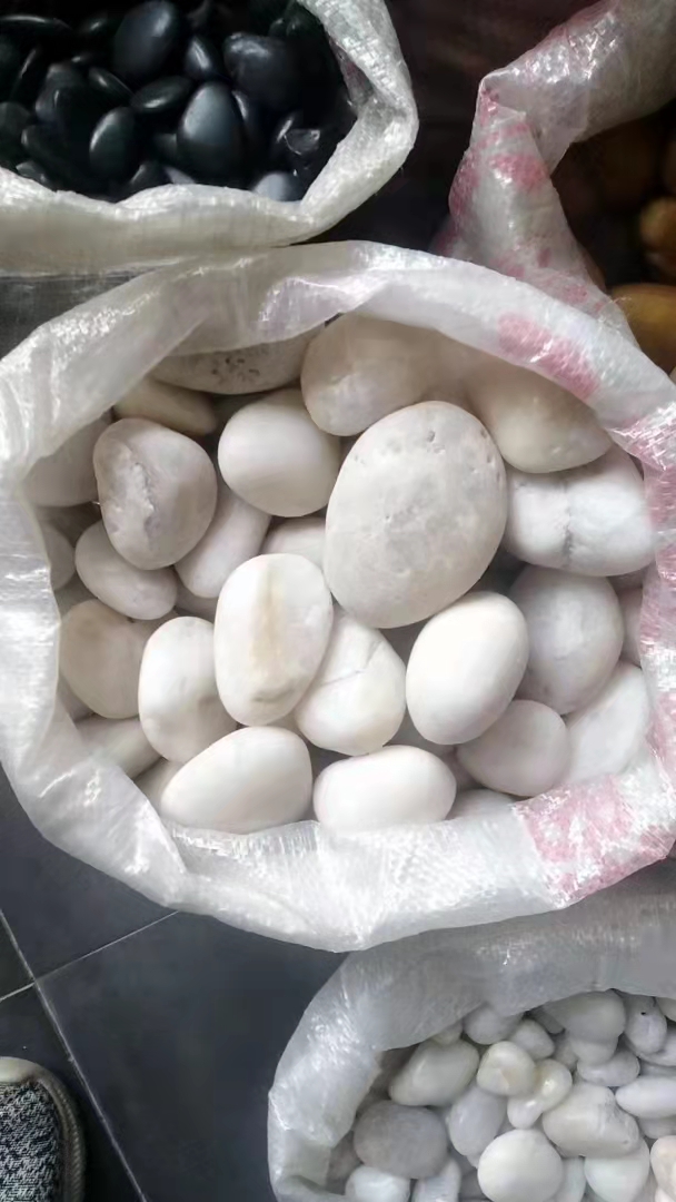 商洛黑色鹅卵石厂家 安康白色鹅卵石批发 西安鹅卵石白色砾石销售 渭南园艺白石子出售