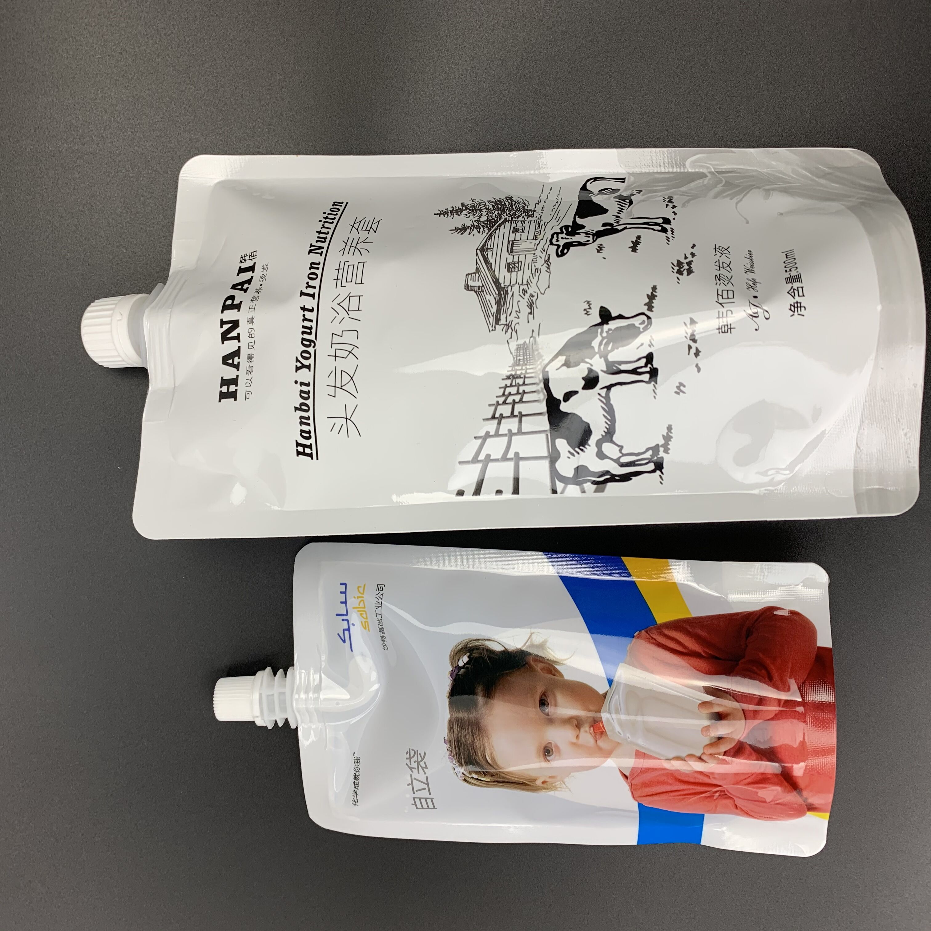 工厂定做透明吸嘴自立袋牛奶豆浆饮料液体包装袋 果汁自立吸嘴袋图片