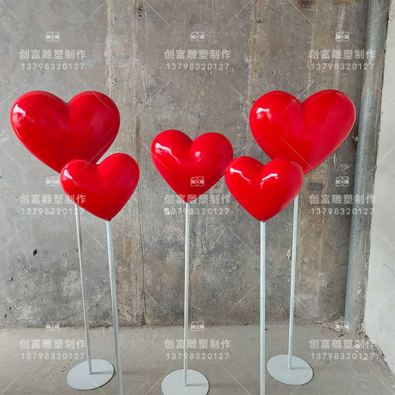 玻璃钢爱心雕塑广东厂家定制美陈爱心装置橱窗装饰心型气球雕塑