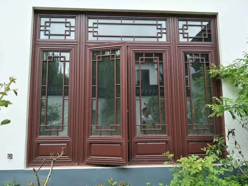 中式铝合金门窗明清古建筑凹弧传统别墅园林木纹仿古门窗图片