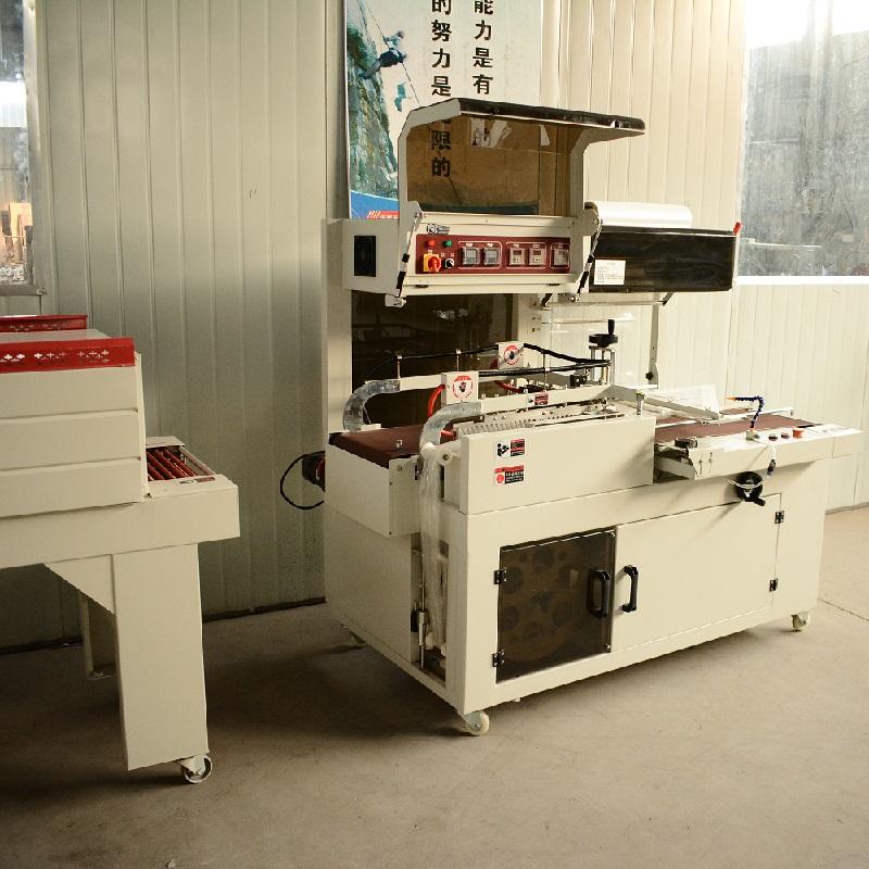 天鲁L型收缩包装机 TL55450济南彩盒套膜收缩机