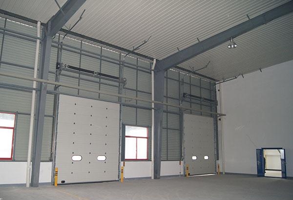 烟台工业滑升门工业提升门工业折叠门电动折叠门